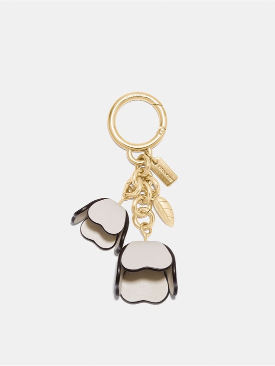 Coach Accessories - Coach Essential Tea Rose Bag Charm in gold and chalk